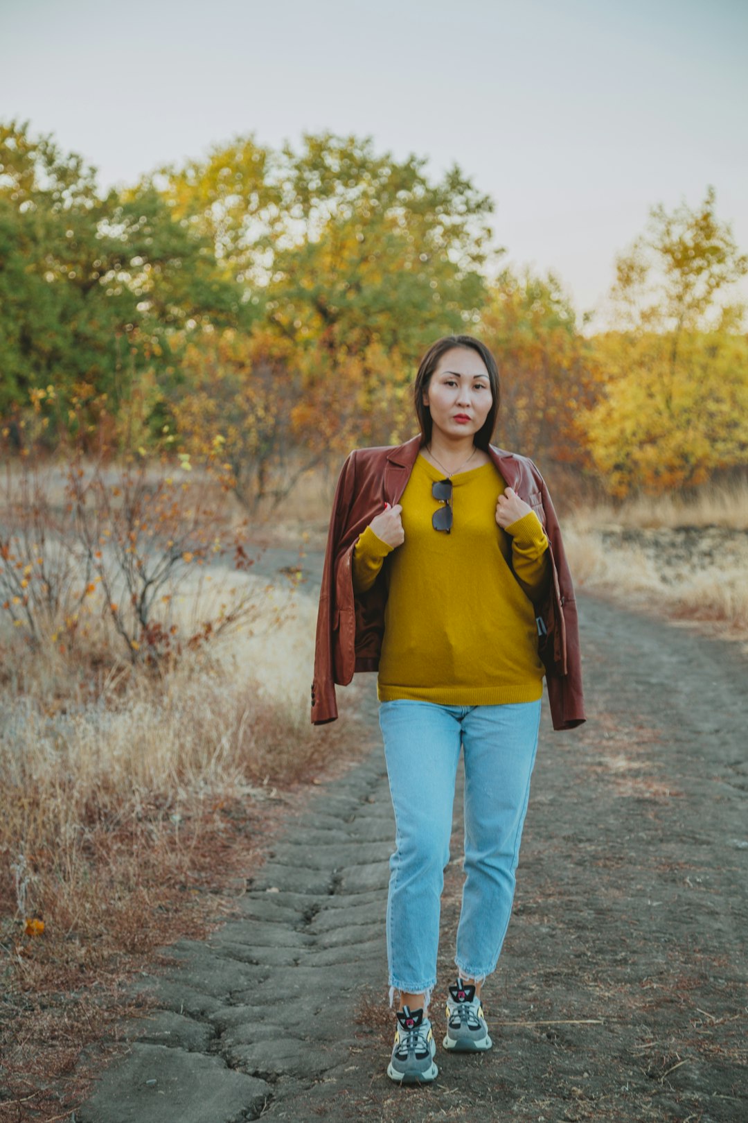 Woman walking outdoors.