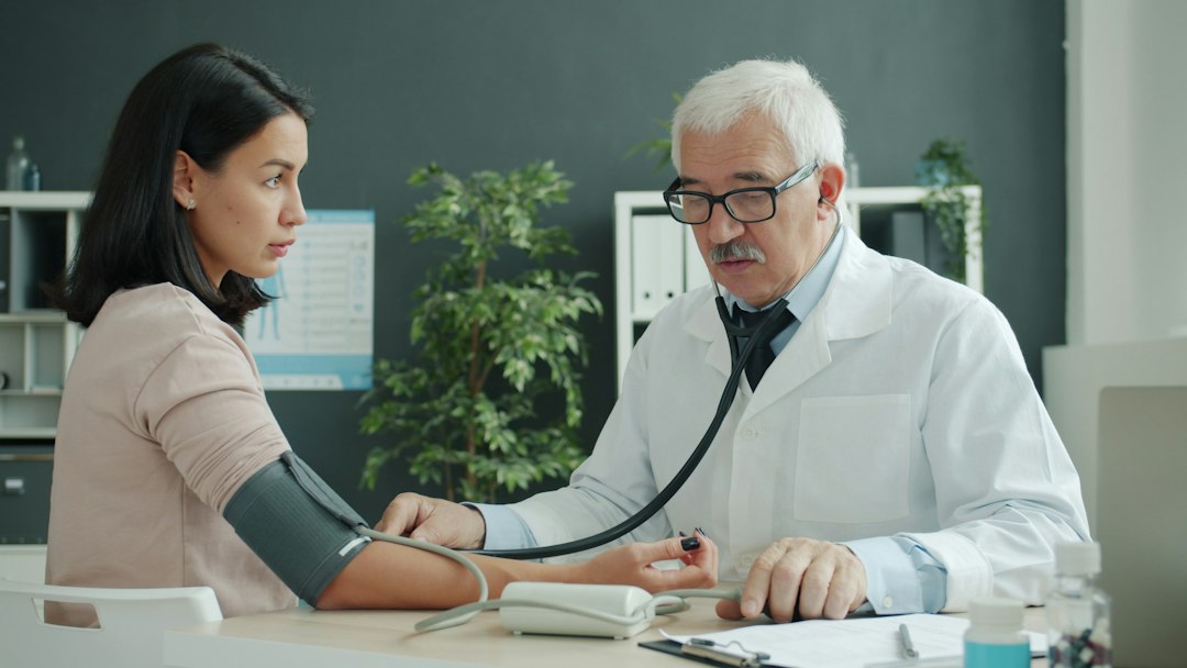 Doctor assessing a patient before medical weight loss treatment