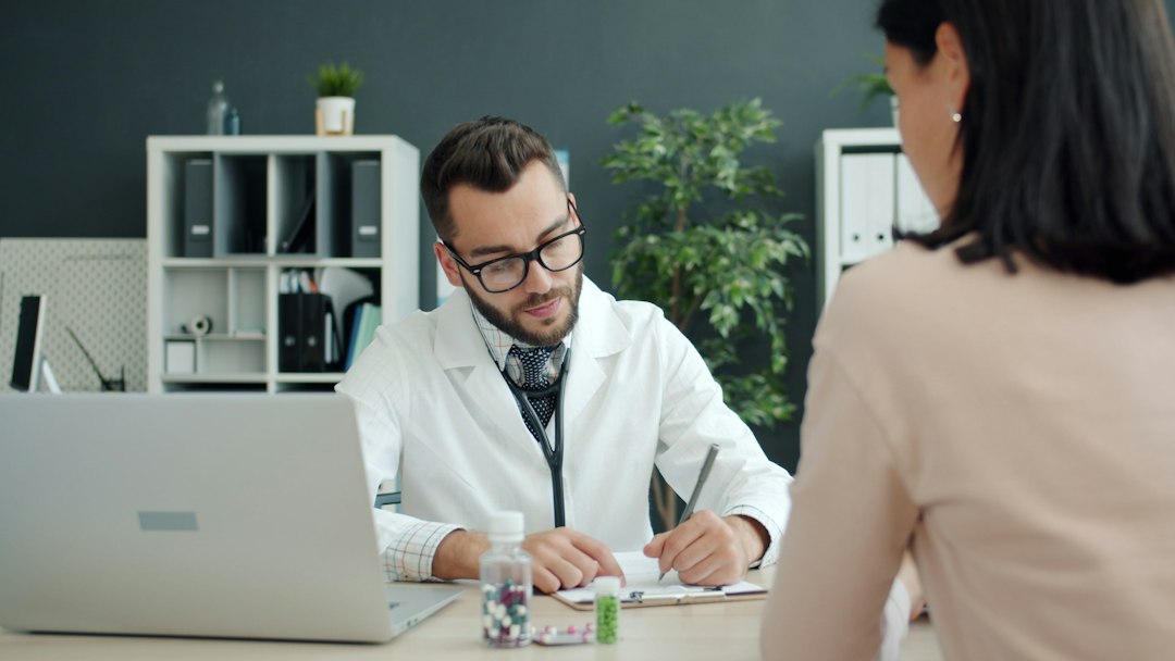 Doctor and patient discussing medically appropriate weight loss treatment